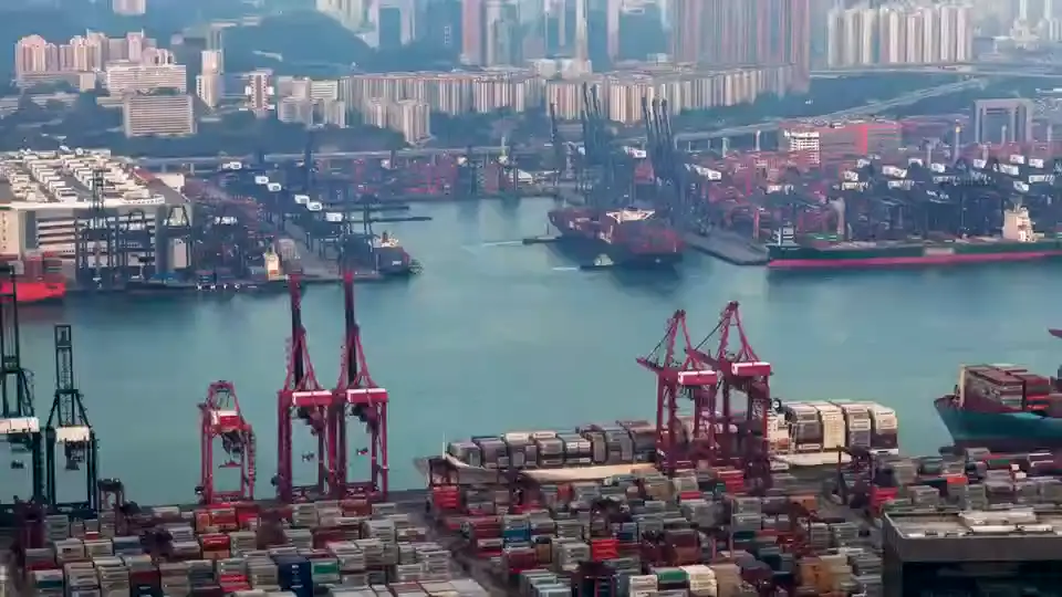 A container ship at a dock.